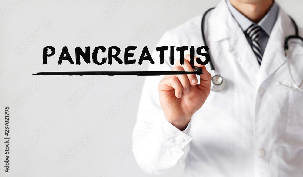 Doctor writing word Pancreatitis with marker, Medical concept Doctor writing word Pancreatitis with marker, Medical concept