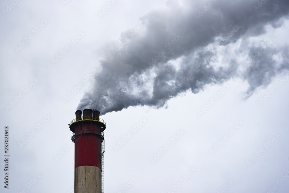 Smoky chimney factory polluting the environment and the air. Smoky chimney factory polluting the environment and the air.