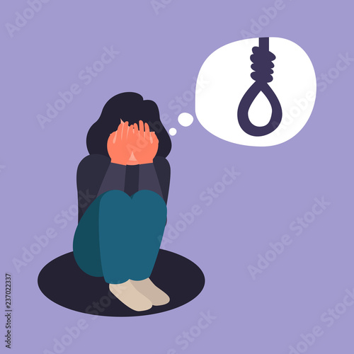 Depression woman sit on the floor. Depressed girl crying covering her face with her hands. Sad teen female think about death. Depressed woman want to commit suicide by hanging photo