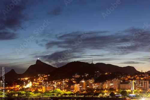 Beautiful panoramic view of the city of Rio de Janeiro with corcovado at dusk. © Imago Photo
