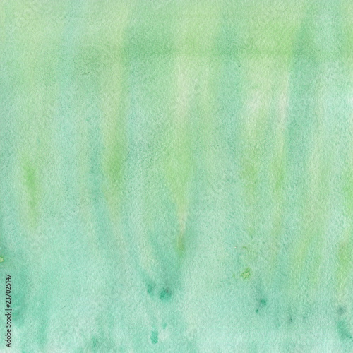 Bright colorful watercolor texture with abstract washes and brush strokes on the white paper background.