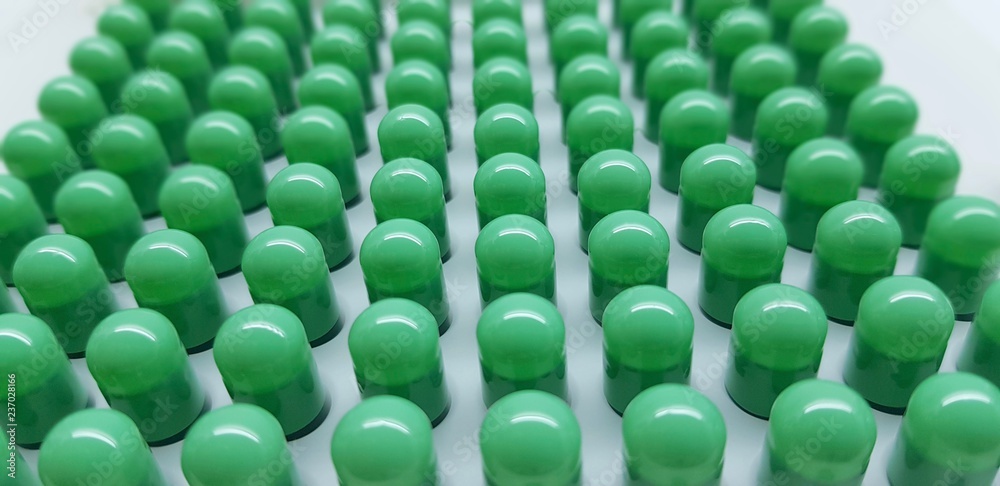 Obraz premium Green capsulas compounding