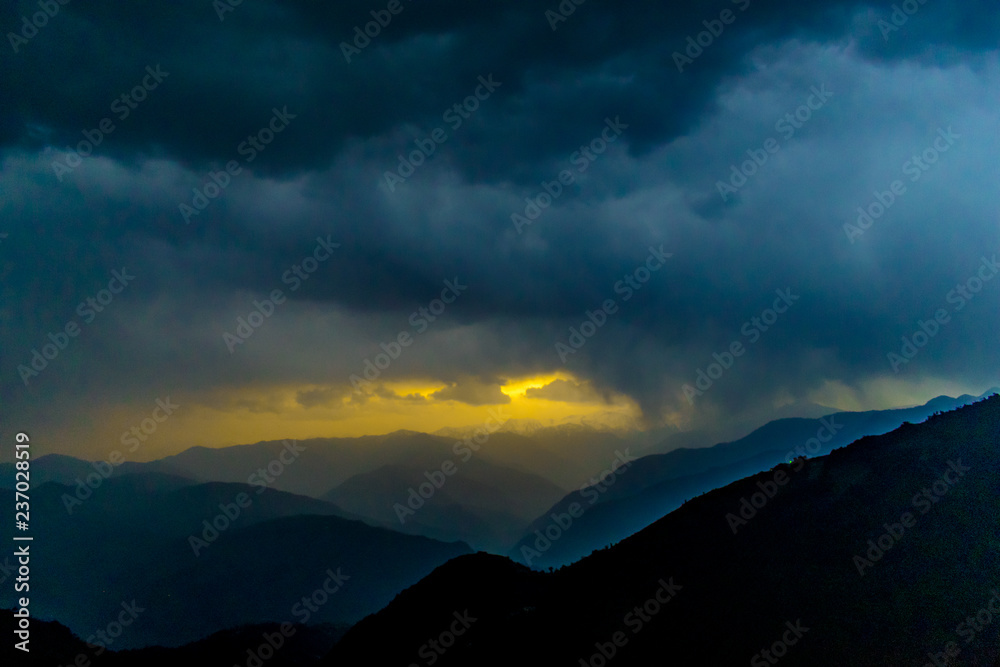 Sunrise over the Pir Panjal Range, clouds, raining, sunrise through the clouds, sunrise over the himalayas, rainy season