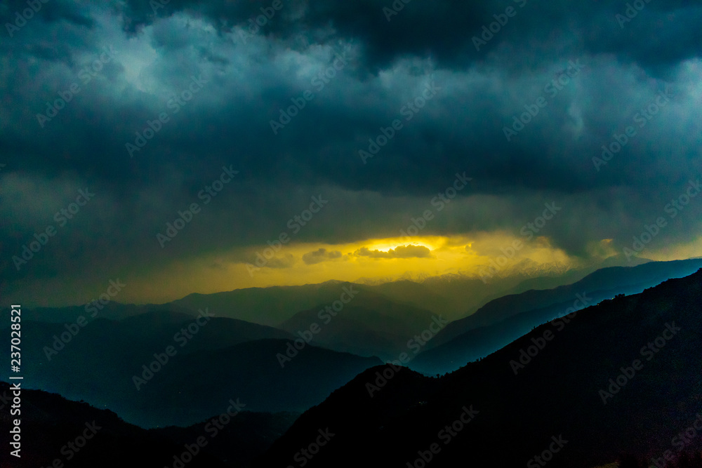 Sunrise over the Pir Panjal Range, clouds, raining, sunrise through the clouds, sunrise over the himalayas, rainy season