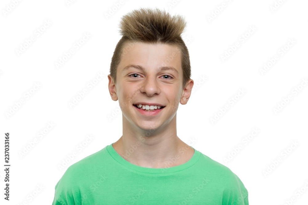 Close-up portrait of happy young laughing teenager boy, smile with teeth, white background isolated Close-up portrait of happy young laughing teenager boy, smile with teeth, white background isolated