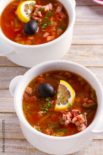 Traditional Russian dish solyanka - thick, spicy and sour saltwort soup
