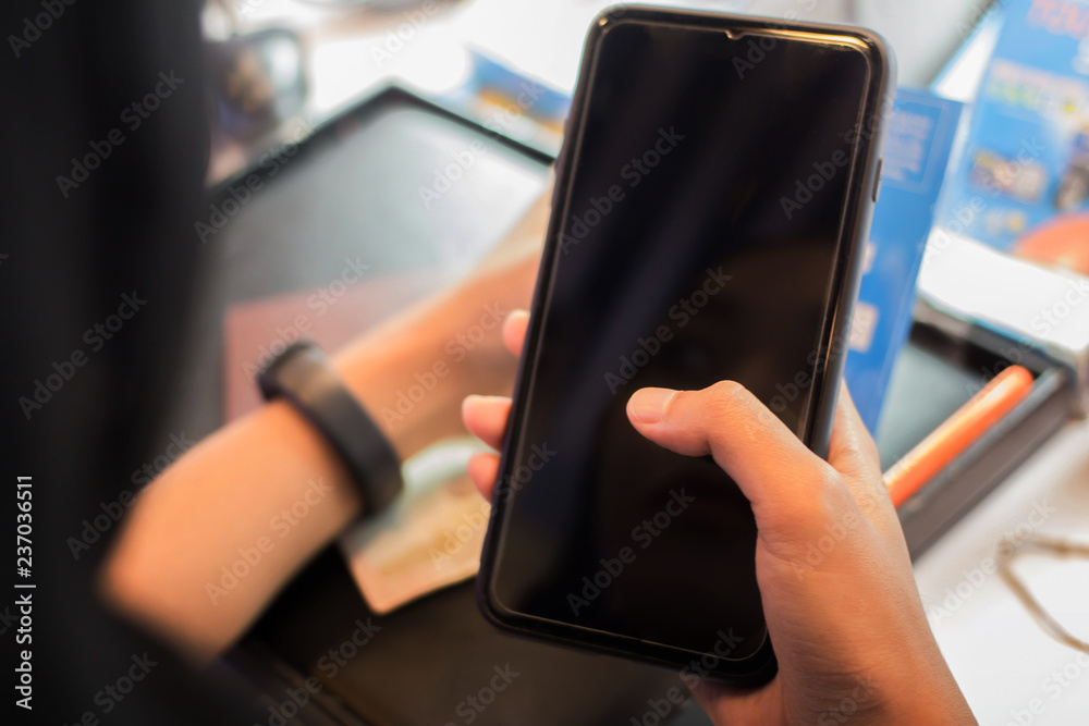 Registration employees are putting nano SIM cards in the store for customers to buy. Registration employees are putting nano SIM cards in the store for customers to buy.