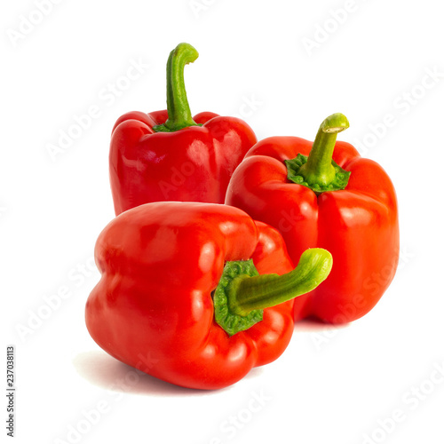 Three sweet bell peppers isolated on white background cutout