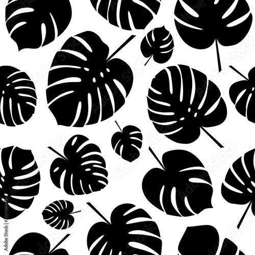 Black and white tropical leaves seamless pattern. Silhouettes of monstera leaf on white background. Vector illustration.