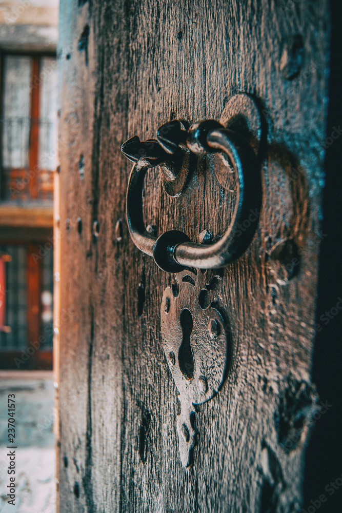 A lock and a handle of a medieval wooden door