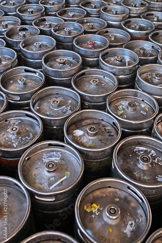 Large barrels or containers for beer in industrial production of metal in large quantities. The concept of production.