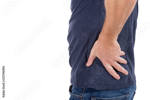 Man suffering from pain in his side. White background. Stomach, liver pain, pancreas, kidneys