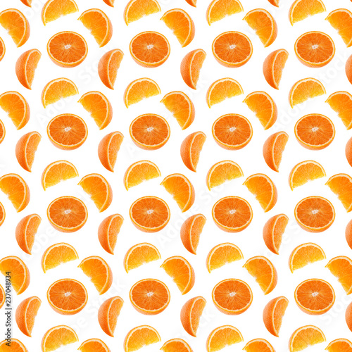 Orange segments pattern isolated on white background. Food background.