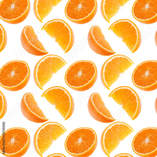 Orange segments isolated on white background. Food background.