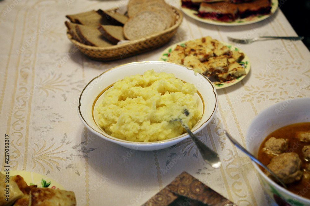 on the table are plates with homemade food on the table are plates with homemade food