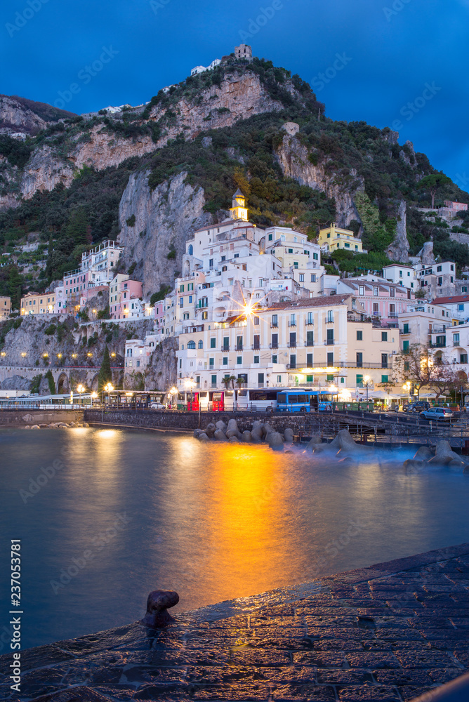 golden lights in the sea in twilight time in Campania region in Italy