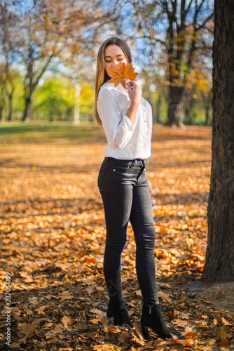 Photographing a girl during autumn with a blurred background © mr2853