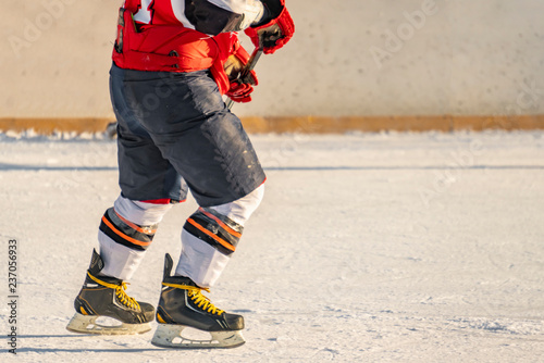 hockey player on the ice skate rink close up shot, winter activities f