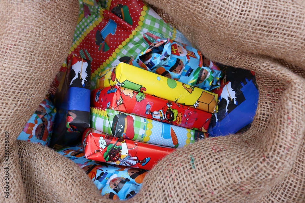 Close up shot of a burlap sack full of presents ready for pakjesavond