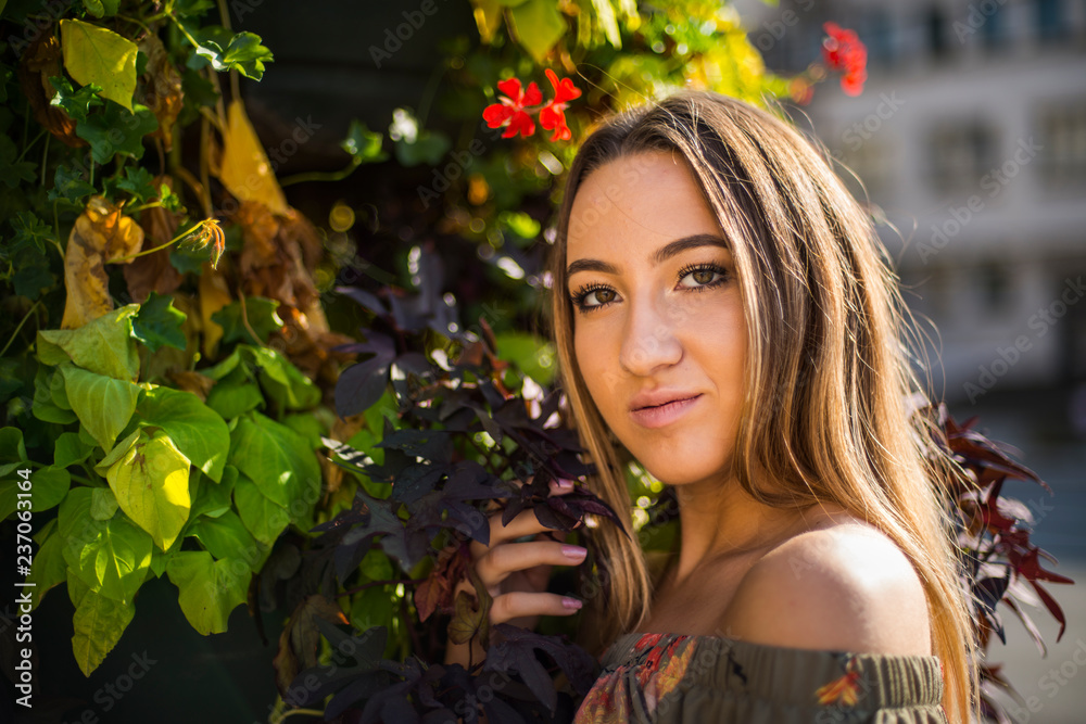 Photographing a girl during autumn with a blurred background Photographing a girl during autumn with a blurred background