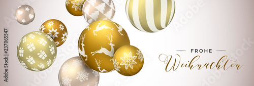 German christmas web banner of gold ornaments