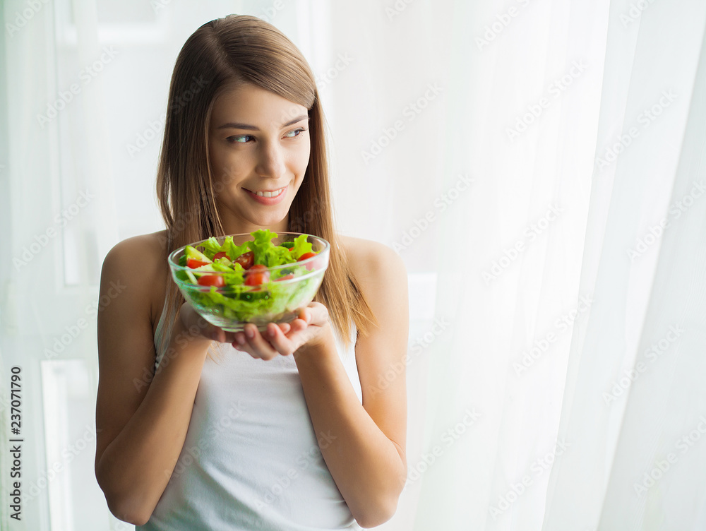 Diet and health.Young woman eating healthy food after workout Diet and health.Young woman eating healthy food after workout