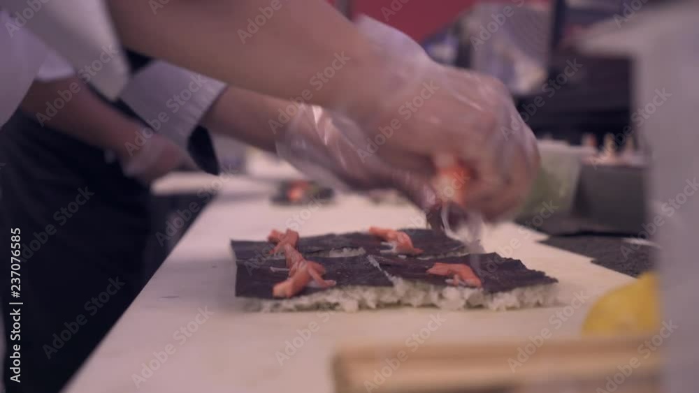 Chef preparing sushi at upscale Asian restaurant 1 Chef preparing sushi at upscale Asian restaurant 1