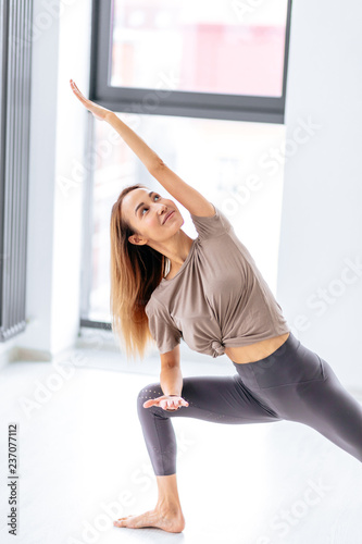 cheerful young beautiful girl spending time on dancing studio. close up photo.