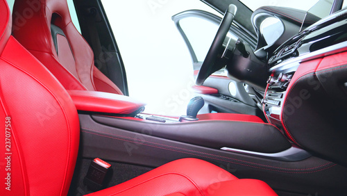 Closely shown are different parts of the car interior. Concept from: Car Garage, Glass lifts, Steering part, After dry cleaning, Absolutely new, New Generation Car. © dkHDvideo