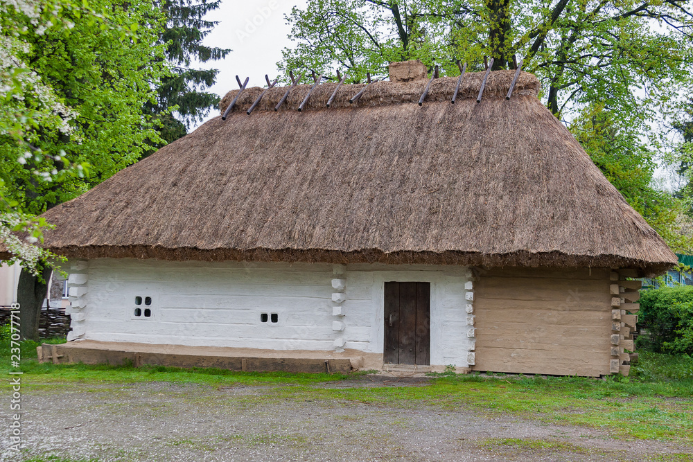 Traditional old Ukrainian rural wooden house Traditional old Ukrainian rural wooden house
