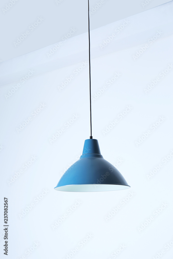 Obraz premium Modern hanging lamp, isolated on white. Idea for interior design