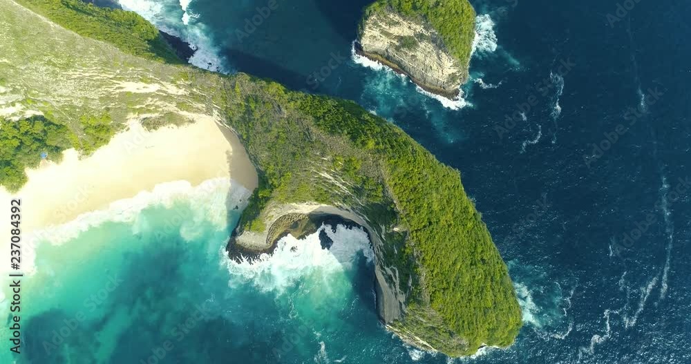 Aerial overhead view popular touristic place of Kelingking Beach in Nusa Penida, Bali, Indonesia. 4K