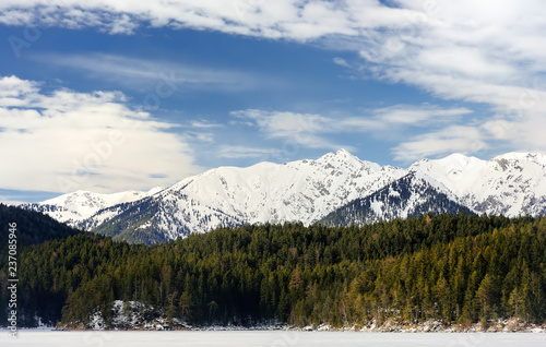 Amazing snowy winter view from cable car to Zugspitze on frozen lake Eibsee © Maria Sbytova