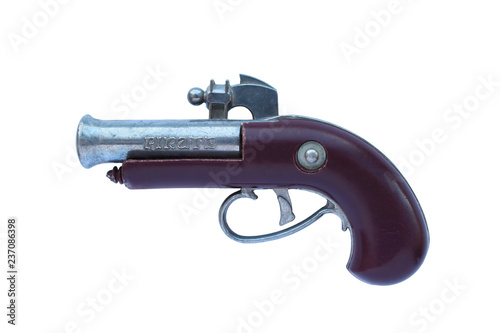 Old pirate pistol. Close-up. Isolated object on white background. Isolate.