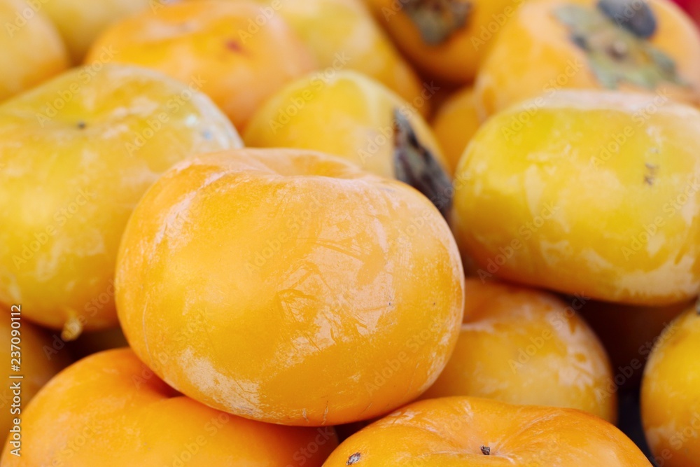 Persimmon fruit at street food Persimmon fruit at street food