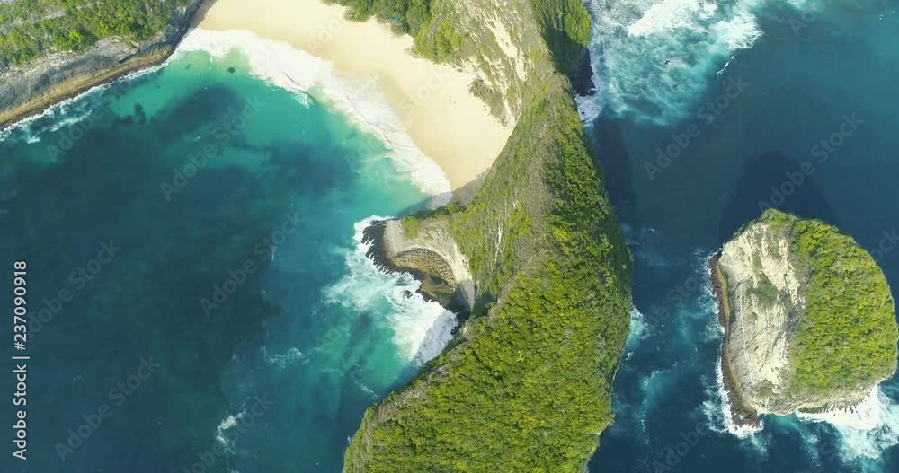 Aerial overhead view popular touristic place of Kelingking Beach in Nusa Penida, Bali, Indonesia. 4K