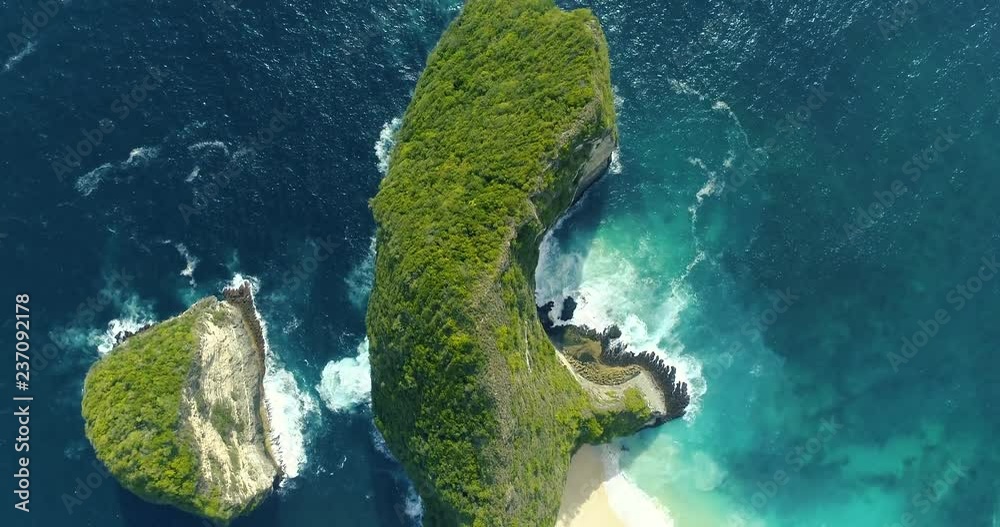 Aerial overhead view popular touristic place of Kelingking Beach in Nusa Penida, Bali, Indonesia. 4K