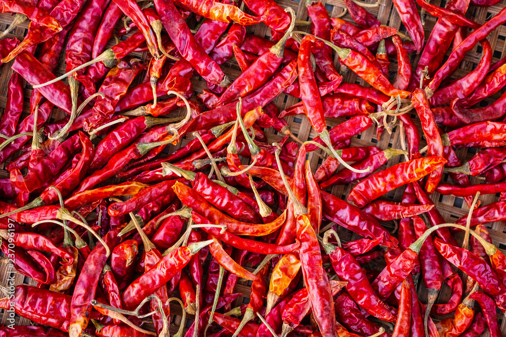 Dried red hot chilli pepper closeup background Dried red hot chilli pepper closeup background