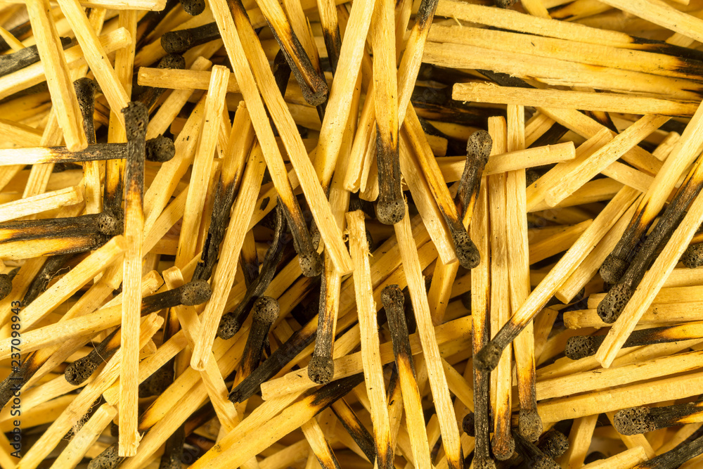 Burnt matches, big slide, close. Charred heads. View from above Burnt matches, big slide, close. Charred heads. View from above
