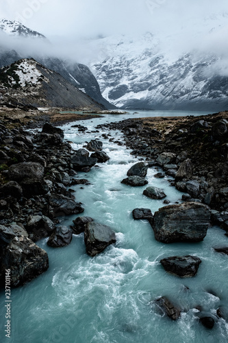 Beautiful view of the blue turquoise river in Hooker Valley track. Mount Cook National Park.