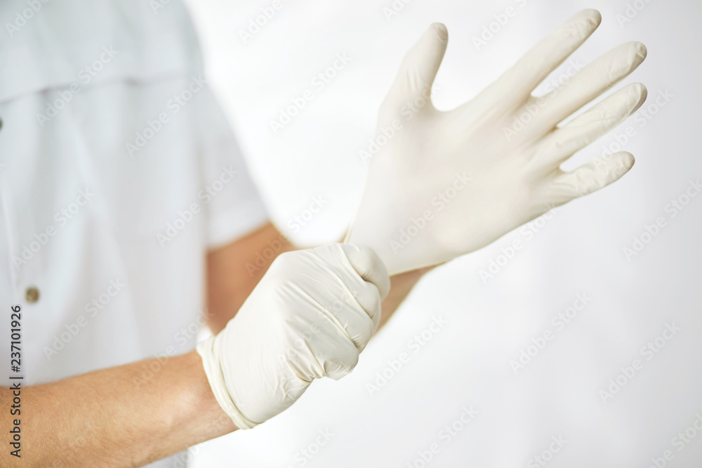 sterilized surgical gloves. close up cropped photo. tool for doctors. latex gloves . protective gloves sterilized surgical gloves. close up cropped photo. tool for doctors. latex gloves . protective gloves