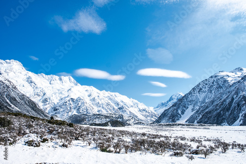 Beautiful view of Mount Cook National Park covered with snow after a snowy day. © Klanarong Chitmung