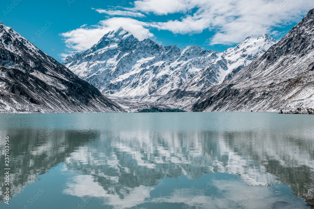 Beautiful view of Mount Cook and the reflection on the hooker lake after a snowy day.
