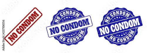 NO CONDOM scratched stamp seals in red and blue colors. Vector NO CONDOM signs with grunge effect. Graphic elements are rounded rectangles, rosettes, circles and text tags.