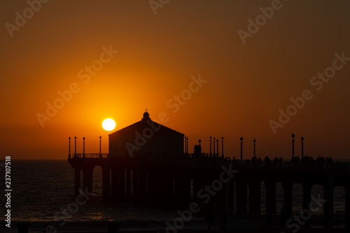 Summer sunset over Manhattan beach pier in California