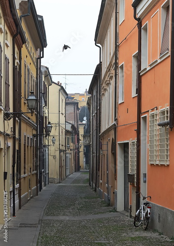 Narrow medieval street in the center of Ferrara  Italy