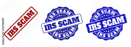 IRS SCAM grunge stamp seals in red and blue colors. Vector IRS SCAM marks with grunge effect. Graphic elements are rounded rectangles, rosettes, circles and text labels.