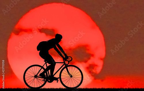 Wallpaper Mural Silhouette man and bike relaxing on sunrise Torontodigital.ca