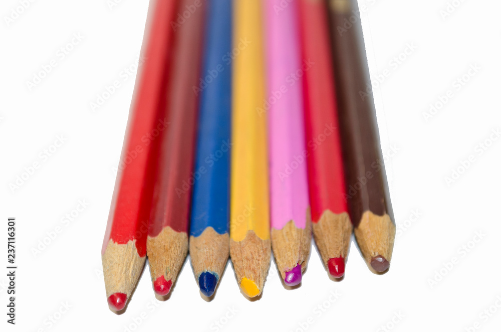 Multicolored pencils on white background Multicolored pencils on white background