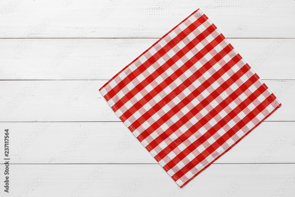 checkered tablecloth on wooden table checkered tablecloth on wooden table